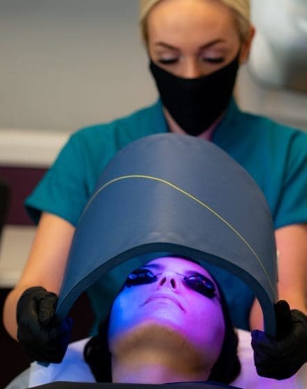 patient receiving Celluma led light therapy treatment